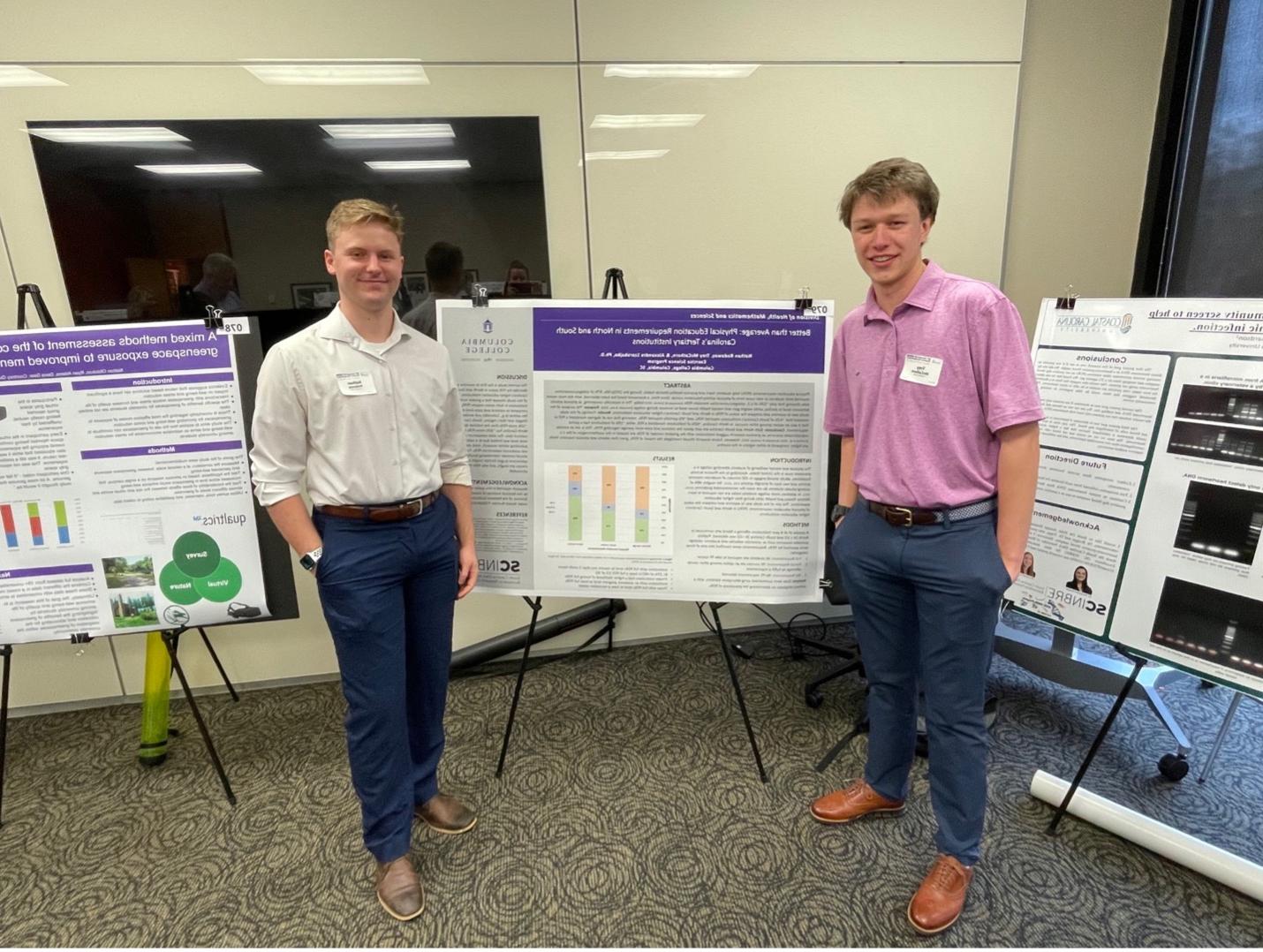 students presenting at science symposium